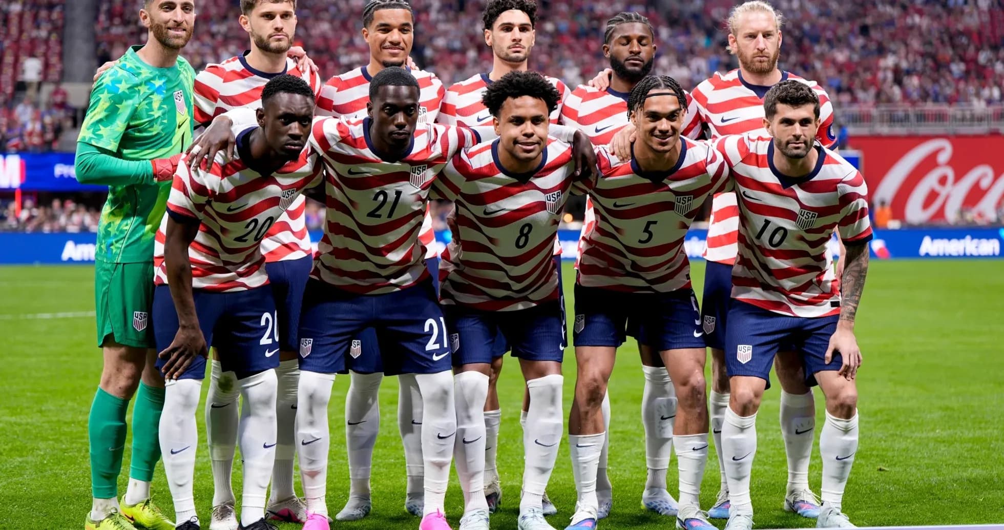 USA national team players posing for a photo