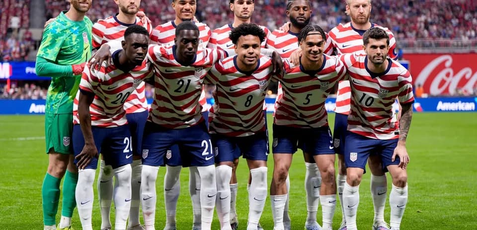USA national team players posing for a photo