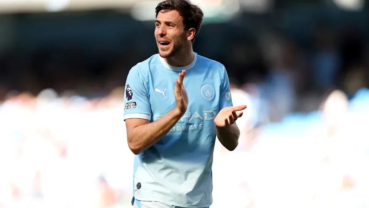 Player applauding fans during match at stadium