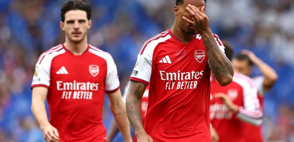 Arsenal players walking off after a match