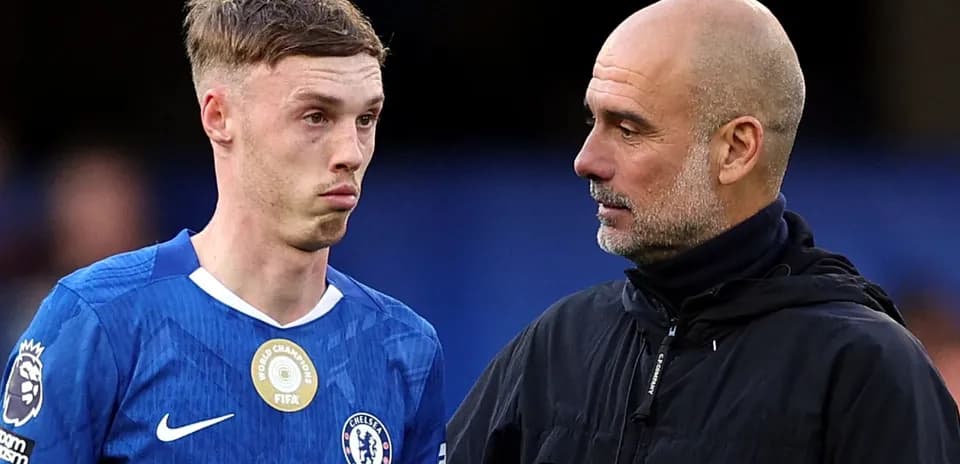 Player and manager discussing during match