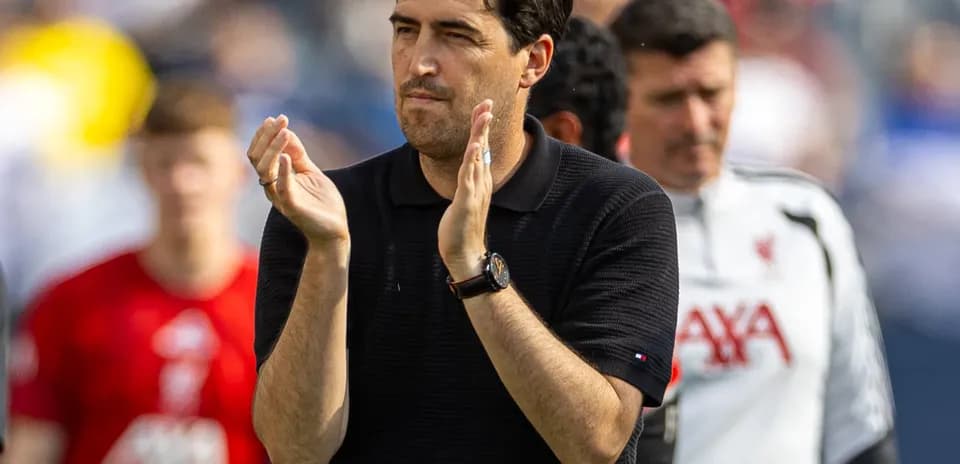 Coach applauding during a match at stadium