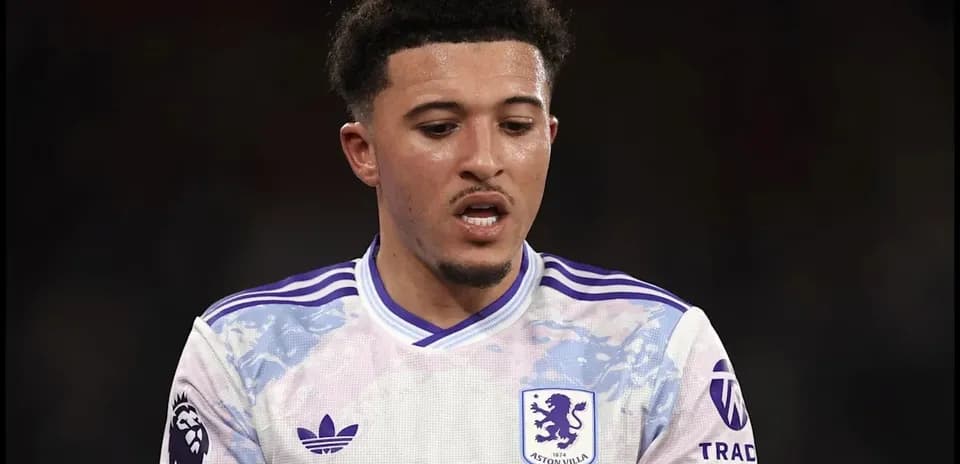 Aston Villa player during a match in white kit