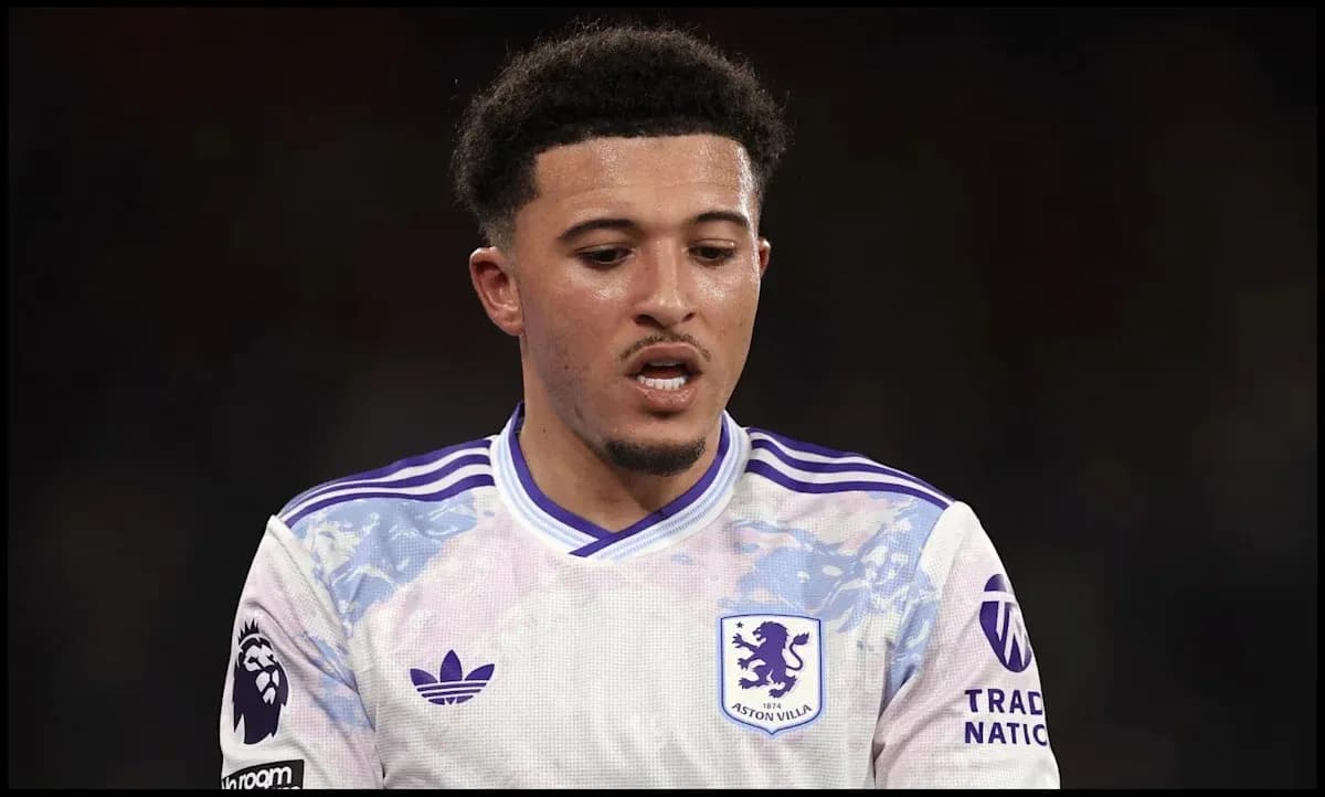Aston Villa player during a match in white kit