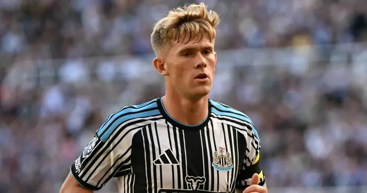 Newcastle United player running during a match