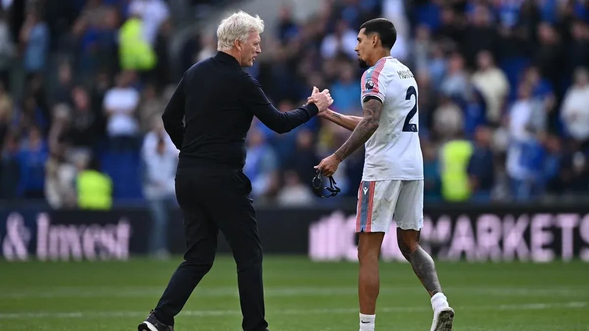 Manager shaking hands with player after match