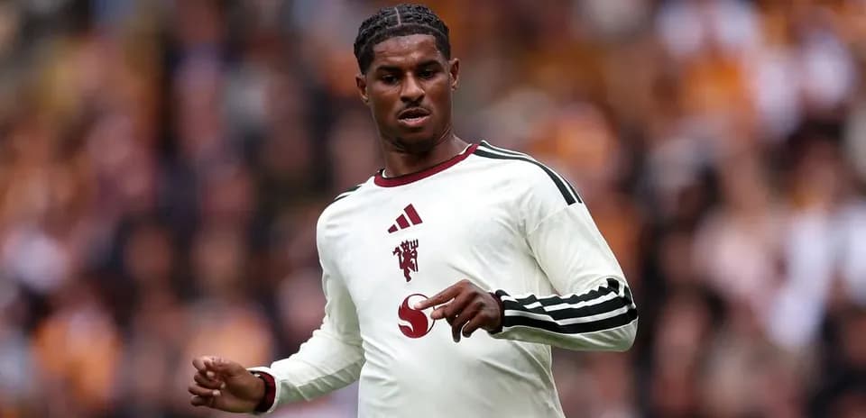 Player in white jersey during match action
