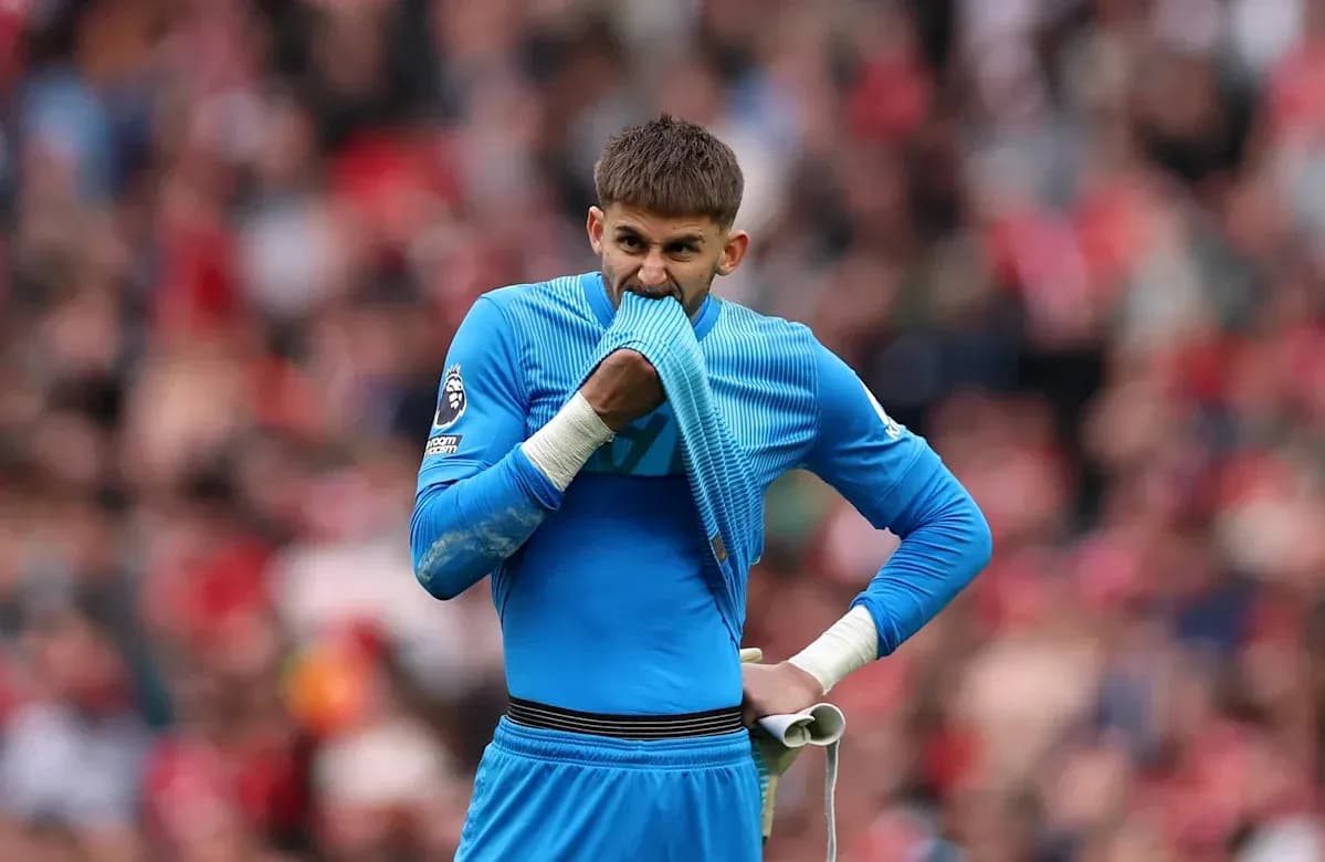 Goalkeeper biting his shirt during a match