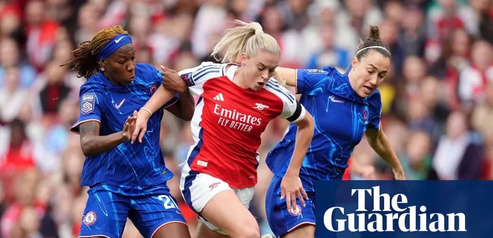 Two players challenging an Arsenal player for the ball