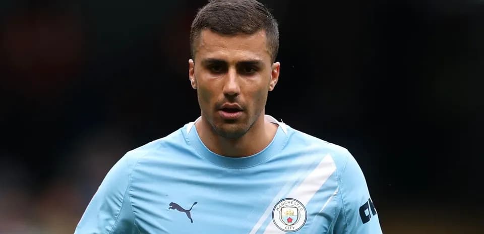 Player wearing Manchester City kit during warm-up