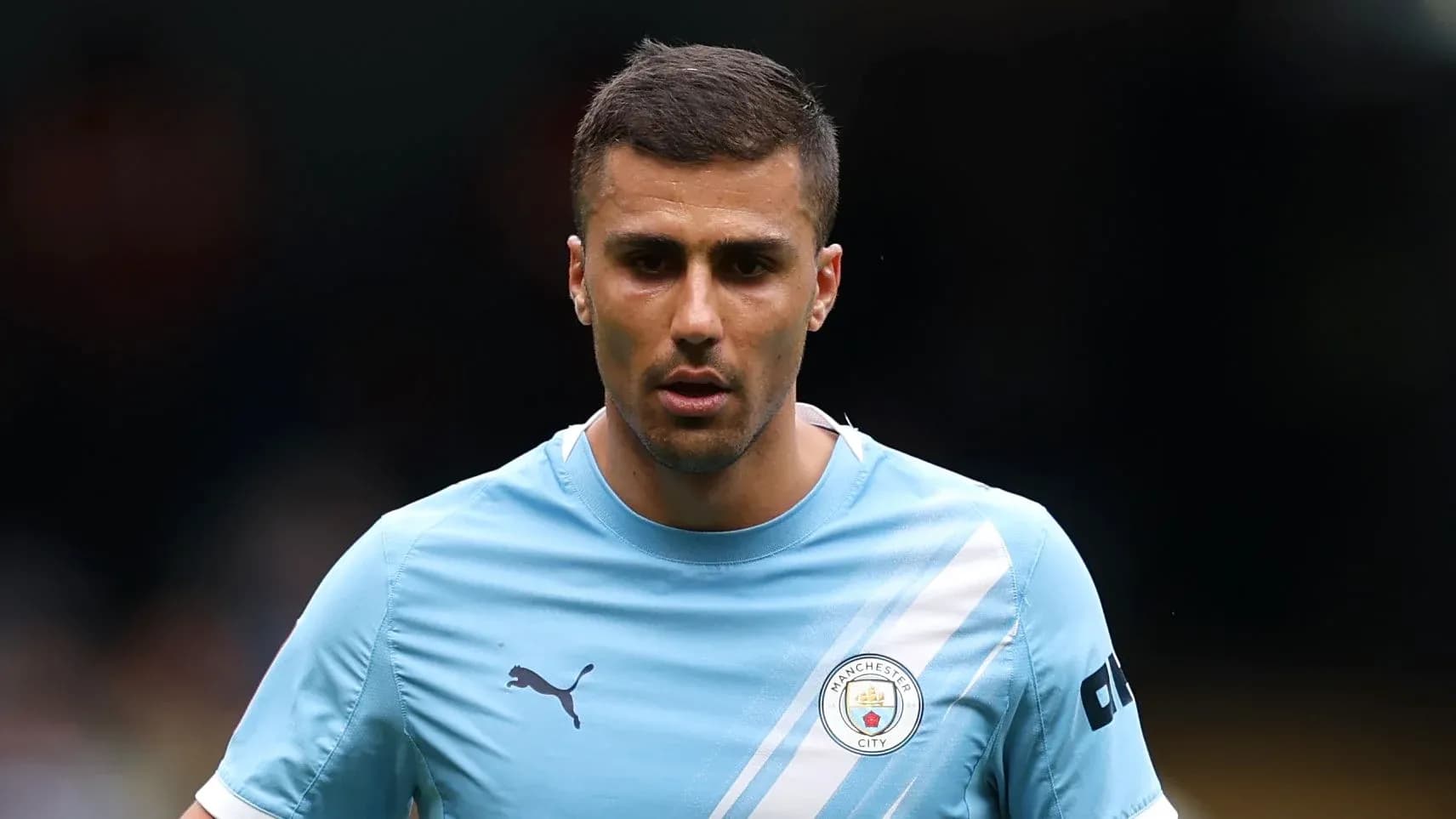 Player wearing Manchester City kit during warm-up