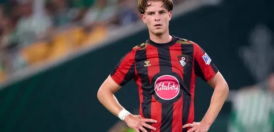 Player in Bournemouth kit during match on field
