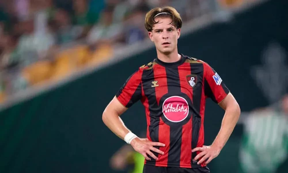 Player in Bournemouth kit during match on field