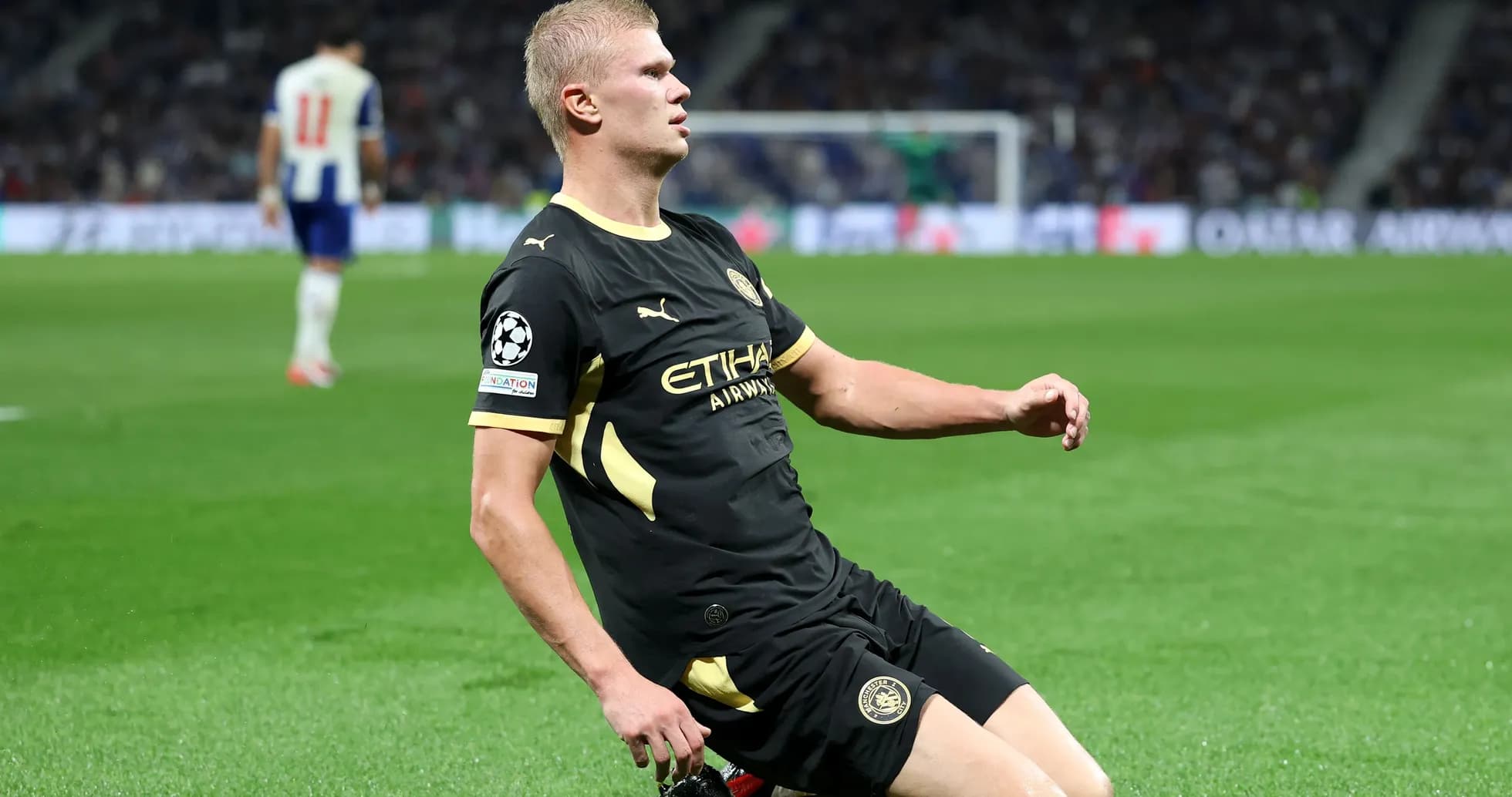 Player on ground during UEFA Champions League match