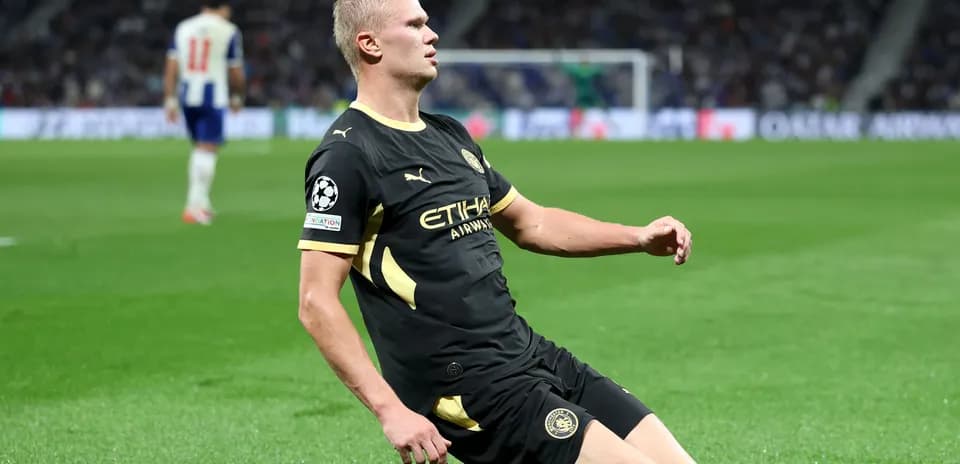 Player on ground during UEFA Champions League match