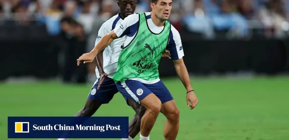 Two players training on the pitch during session
