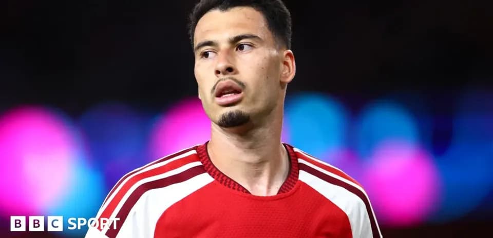 Arsenal player during a match with blurred background