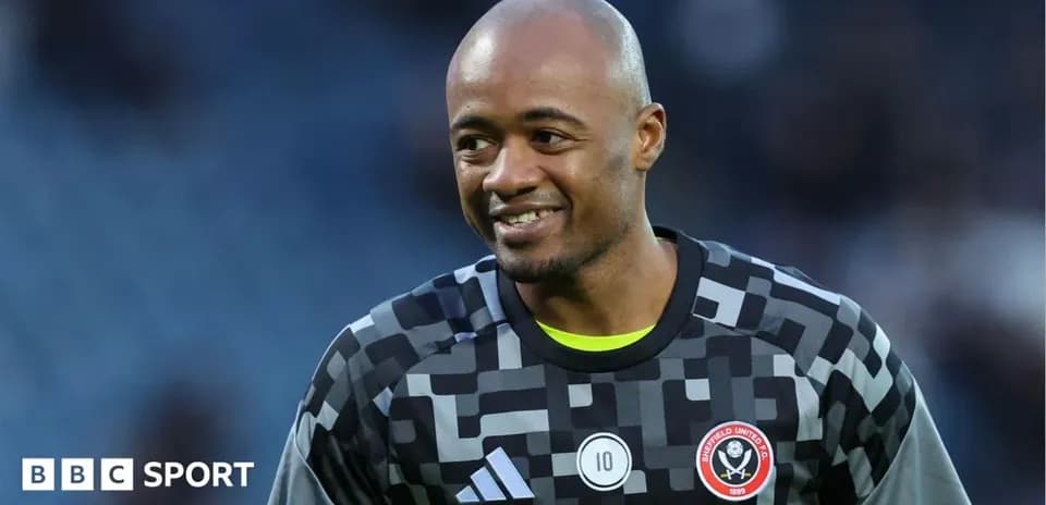 Goalkeeper smiling during warm-up before match