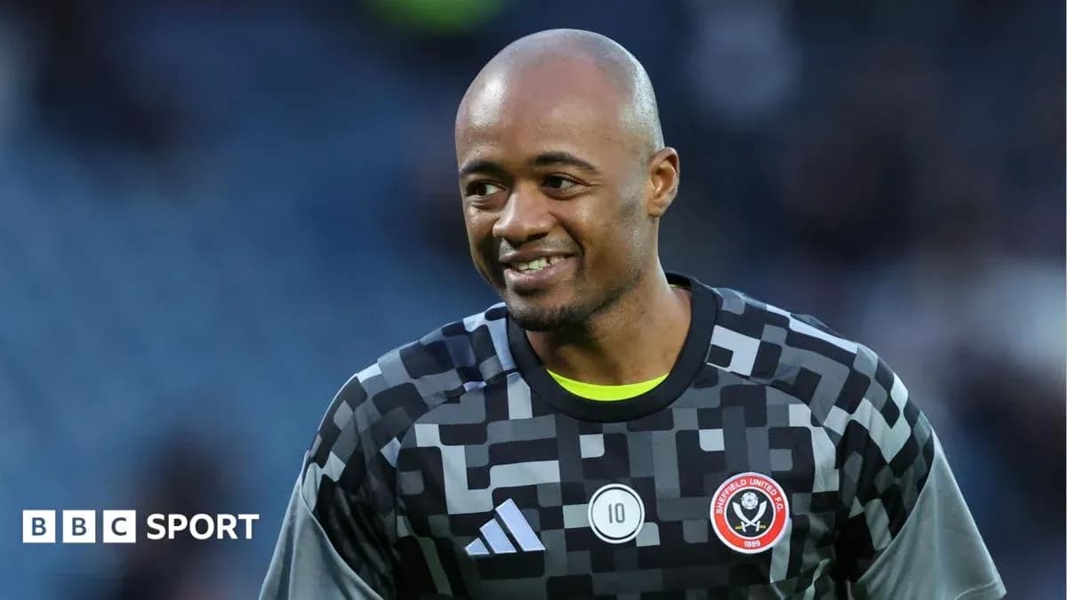Goalkeeper smiling during warm-up before match
