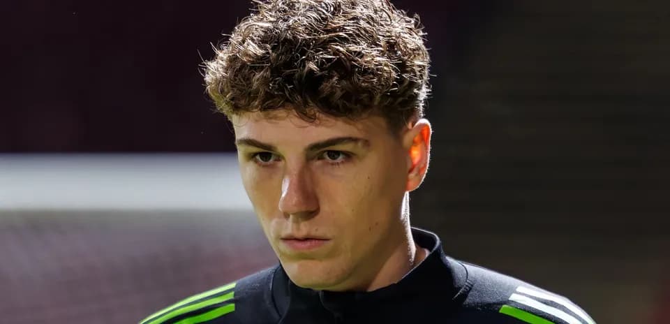 Player in black training gear before match