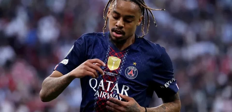 Player adjusting jersey during match at stadium