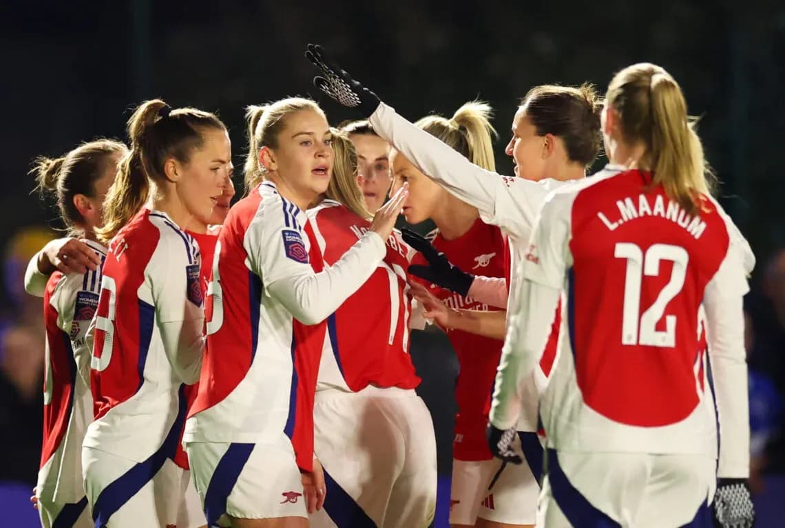 Arsenal W players celebrating during match