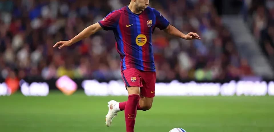 Player kicking the ball during a match