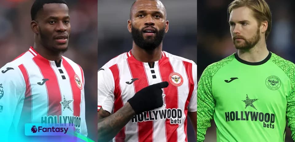 Three Brentford players in team jerseys and goalkeeper kit
