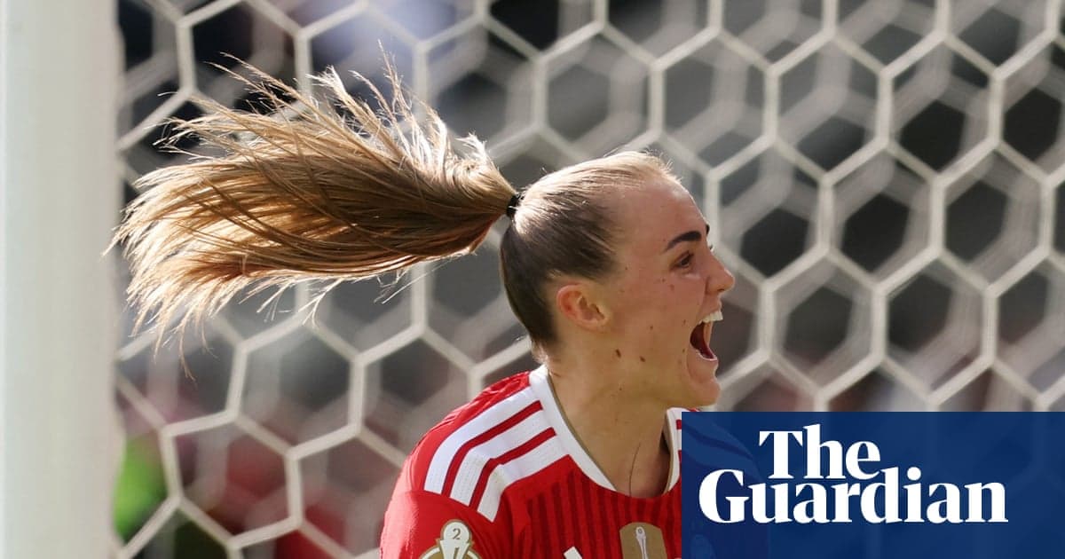 Goalkeeper celebrating with hair in ponytail
