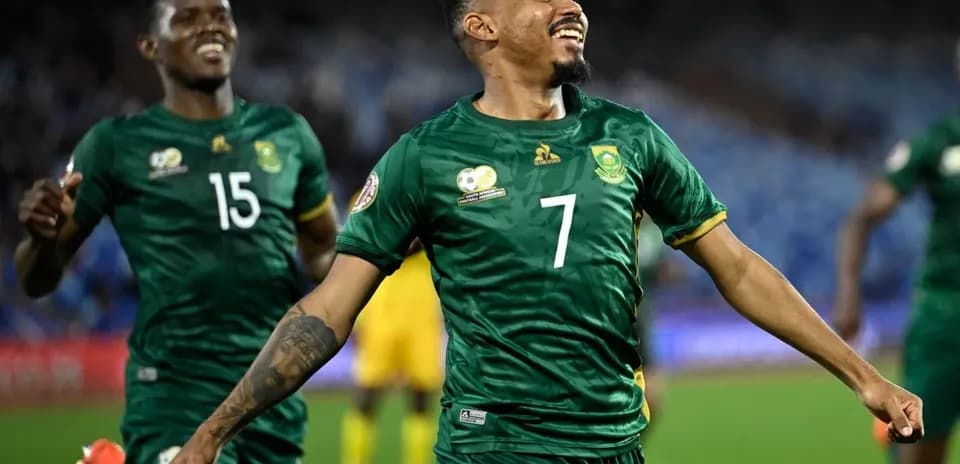 Player celebrating a goal during a football match