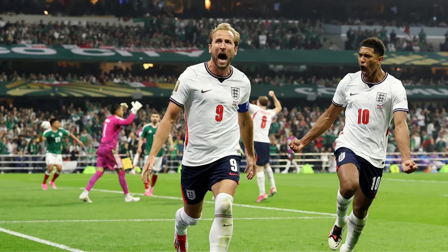 England players celebrating a goal during match