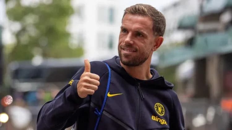 Player giving thumbs up outside training facility