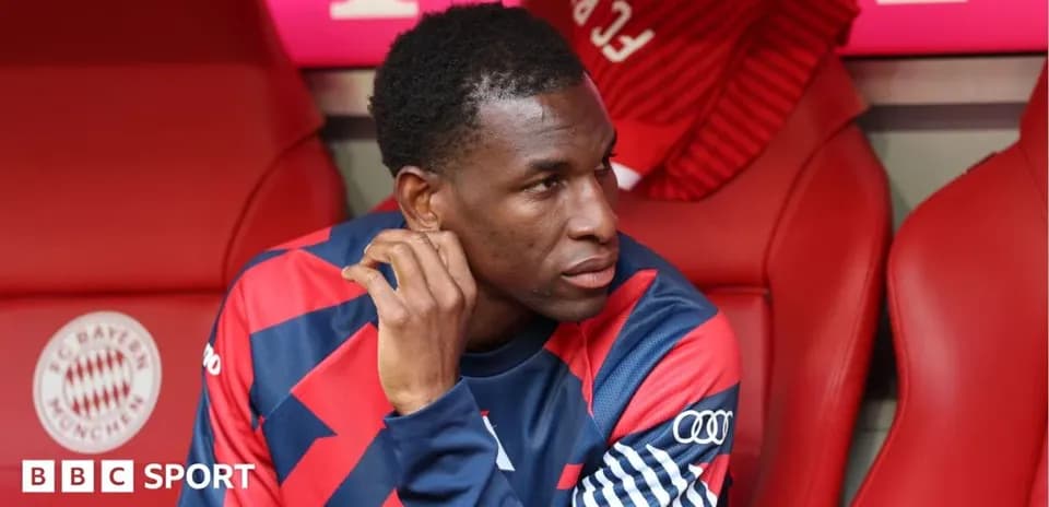 Player seated on bench during match