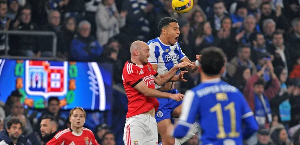 Players contesting a high ball during match