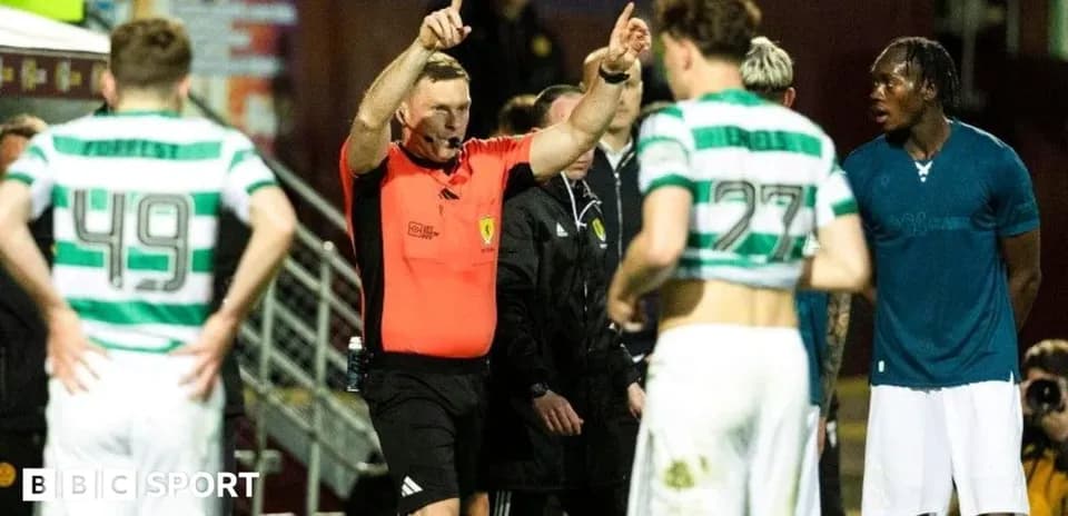 Referee issuing a decision during a football match