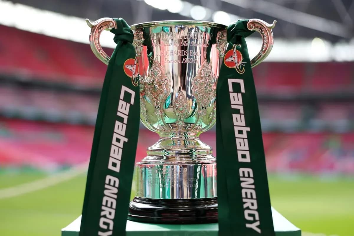 Carabao Cup trophy with green ribbons on display