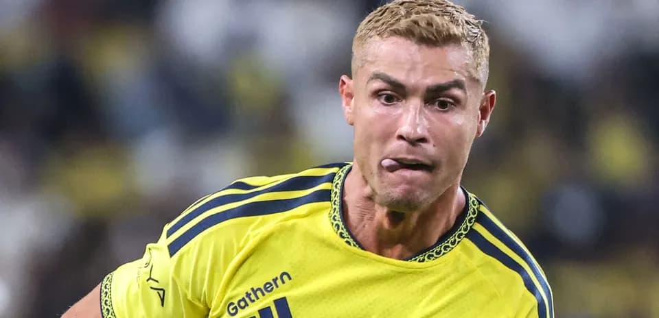 Player in yellow jersey running during match