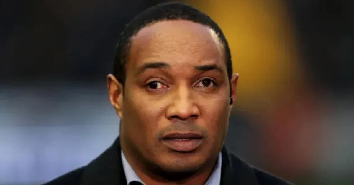 Man with serious expression speaking off-camera