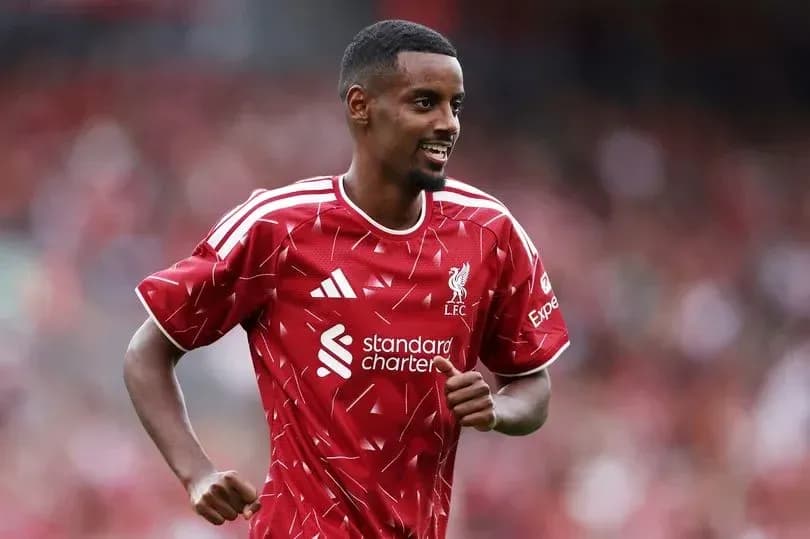Player celebrating during Liverpool match at stadium