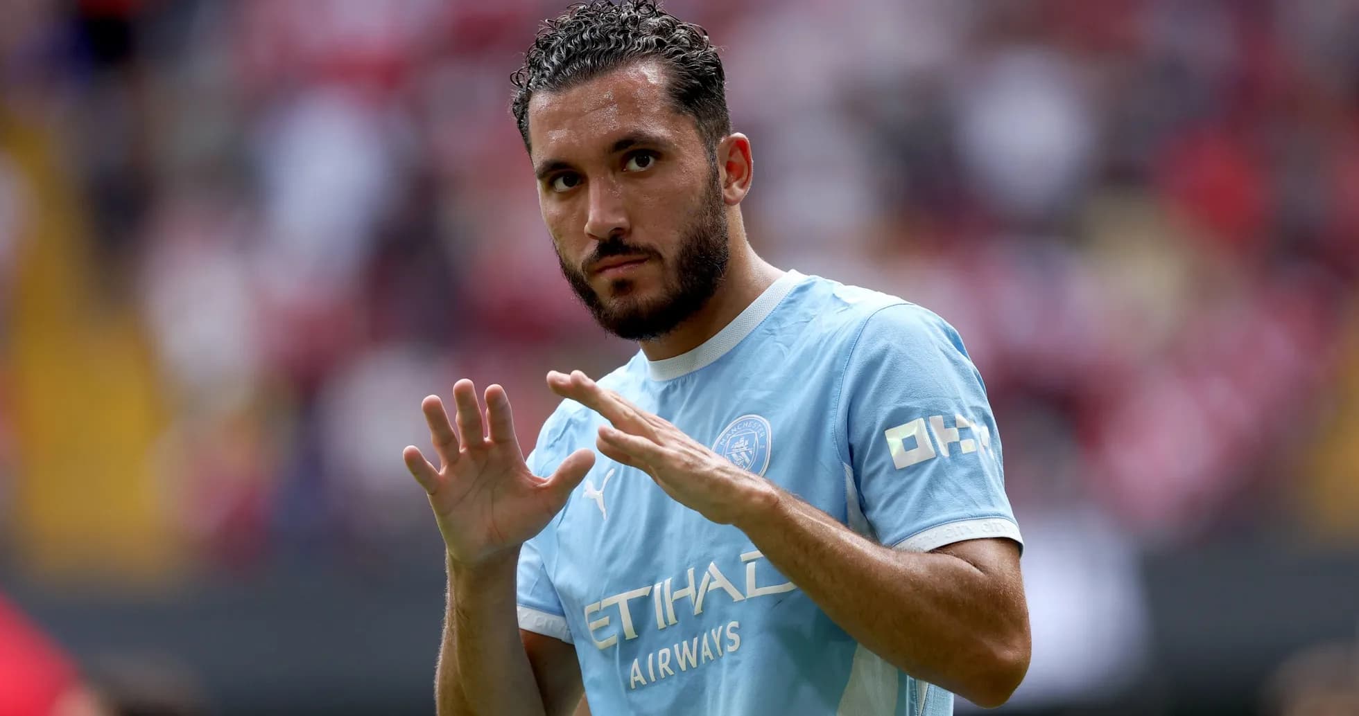 Player gesturing during warm-up before match