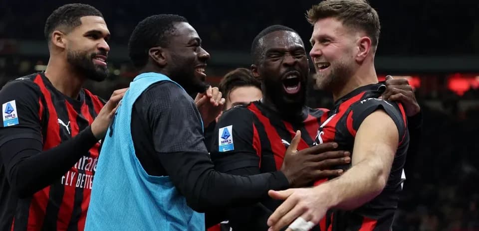 AC Milan players celebrating a goal