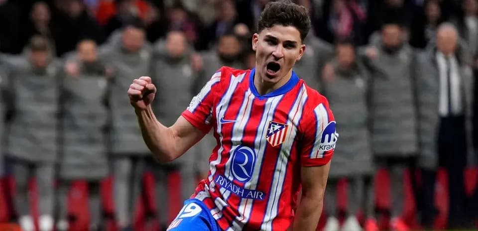 Player celebrating a goal for Atlético Madrid
