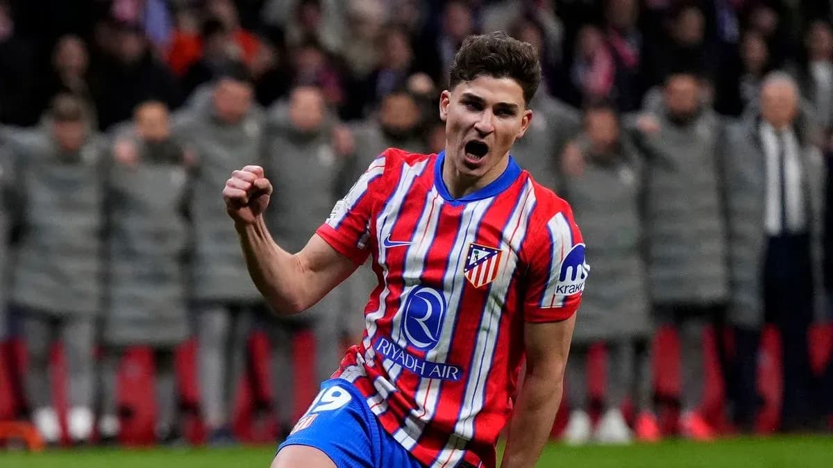 Player celebrating a goal for Atlético Madrid