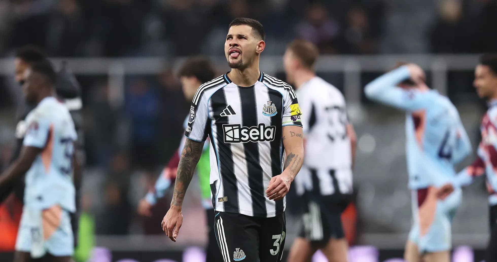 Newcastle player walking off field after match