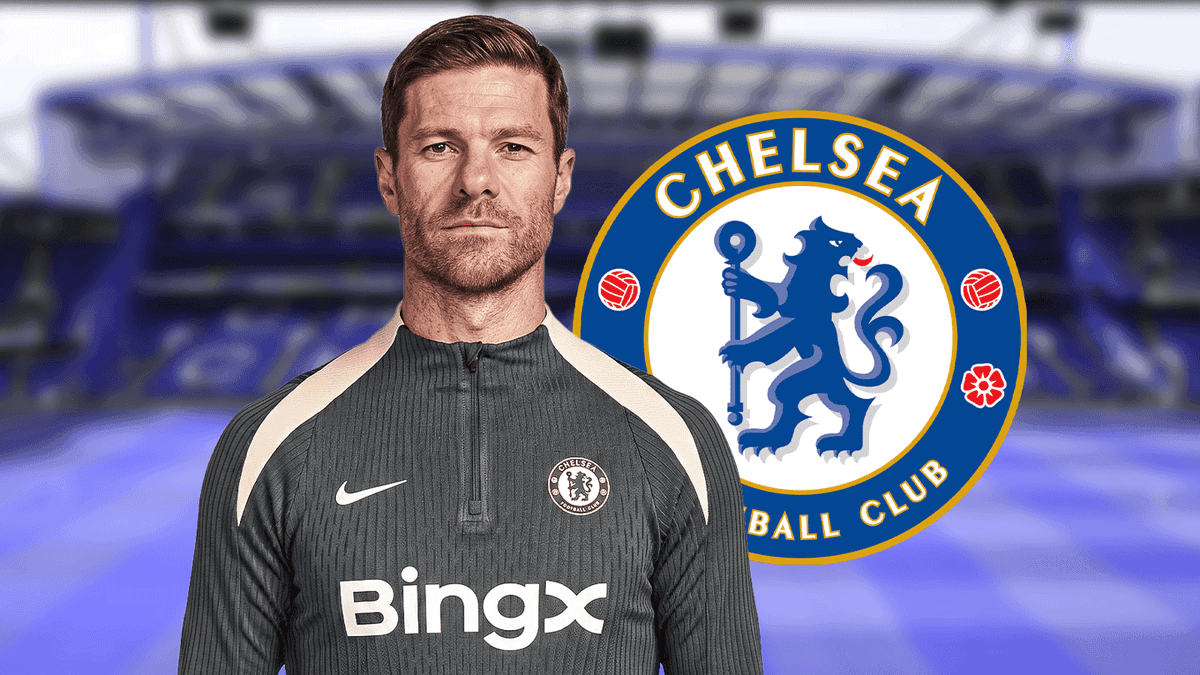 Coach in Chelsea training gear with club logo Coach in Chelsea training gear with club logo