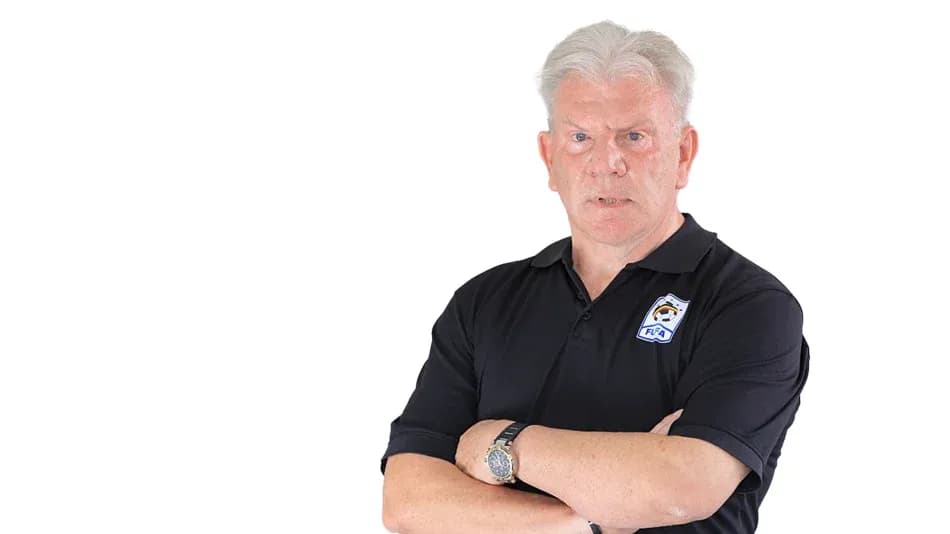 Man with arms crossed wearing a black polo shirt Man with arms crossed wearing a black polo shirt
