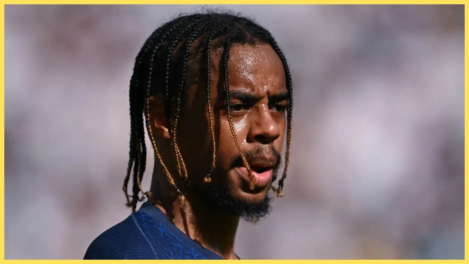 Player with braided hair during match warm-up Player with braided hair during match warm-up