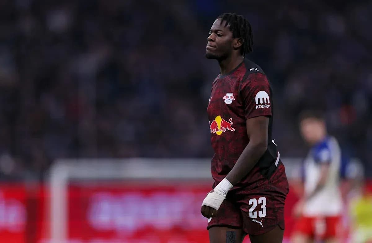 Player in RB Leipzig kit walking on field Player in RB Leipzig kit walking on field