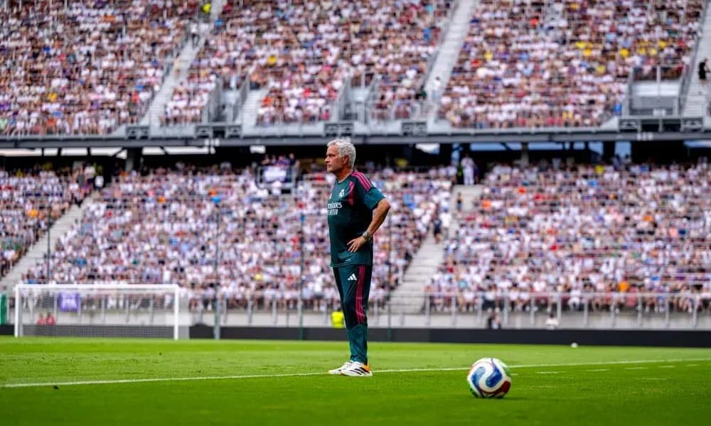 Coach standing on the sideline during match Coach standing on the sideline during match