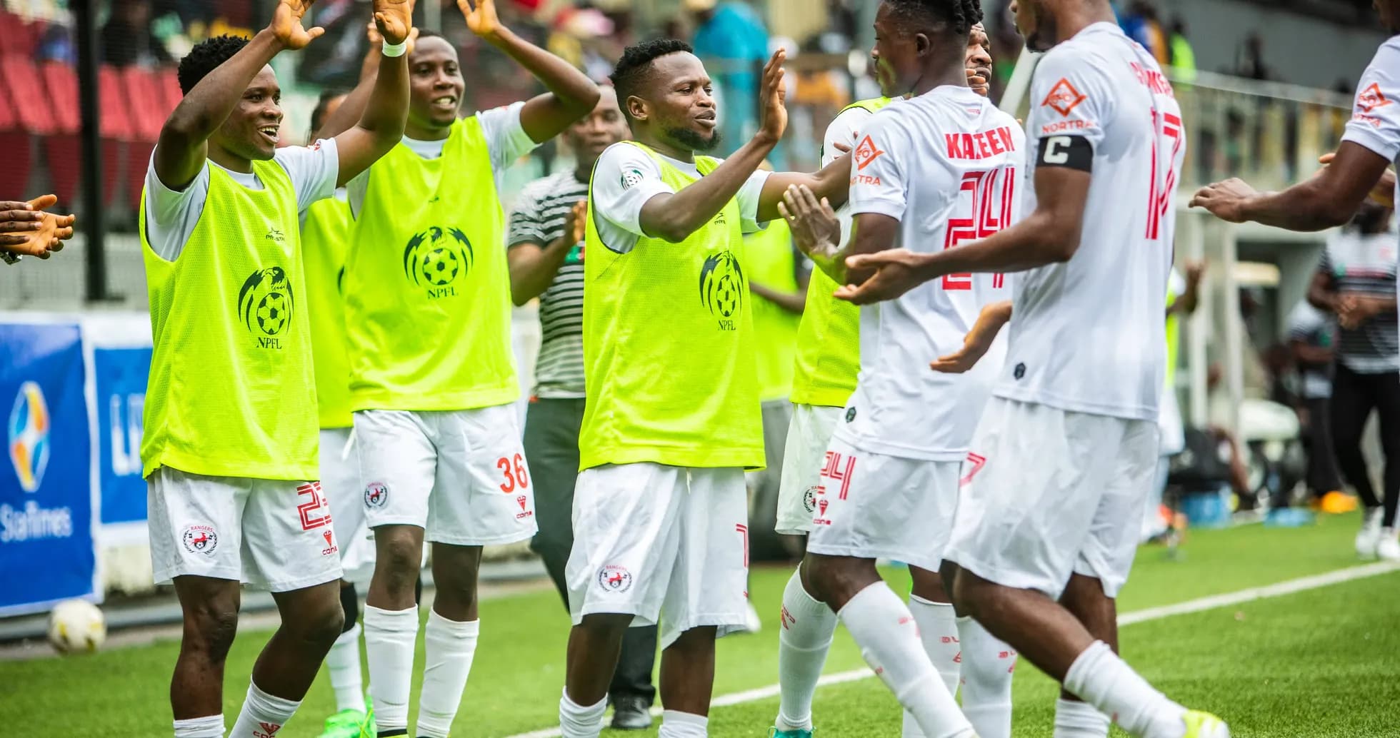 Enugu Rangers players celebrating on the pitch Enugu Rangers players celebrating on the pitch